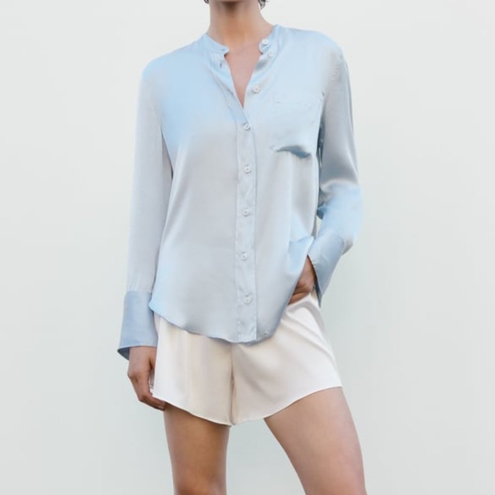 NWT LIGHT SKY BLUE 100% SILK BLOUSE LIMITED EDITION.